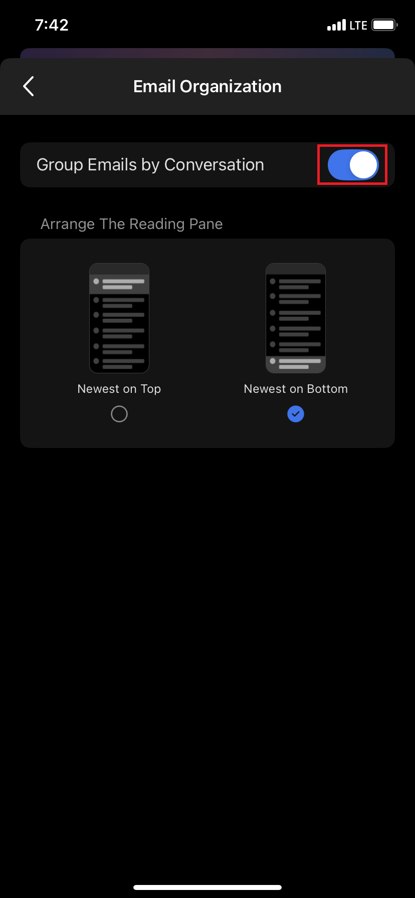 The "Email Organization" setting screen, with the toggle switch for "Group Emails by Conversation" highlighted.